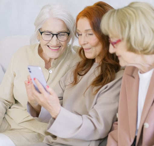 Image of older women video chatting on smartphone